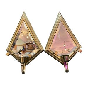 MCM patching pair of mirrored sconces. Beautiful shape and design.